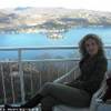 io sul terrazzo della stanza dell'hotel con isola in sfondo ITALIA 