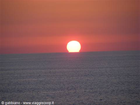 palla di fuoco in mare