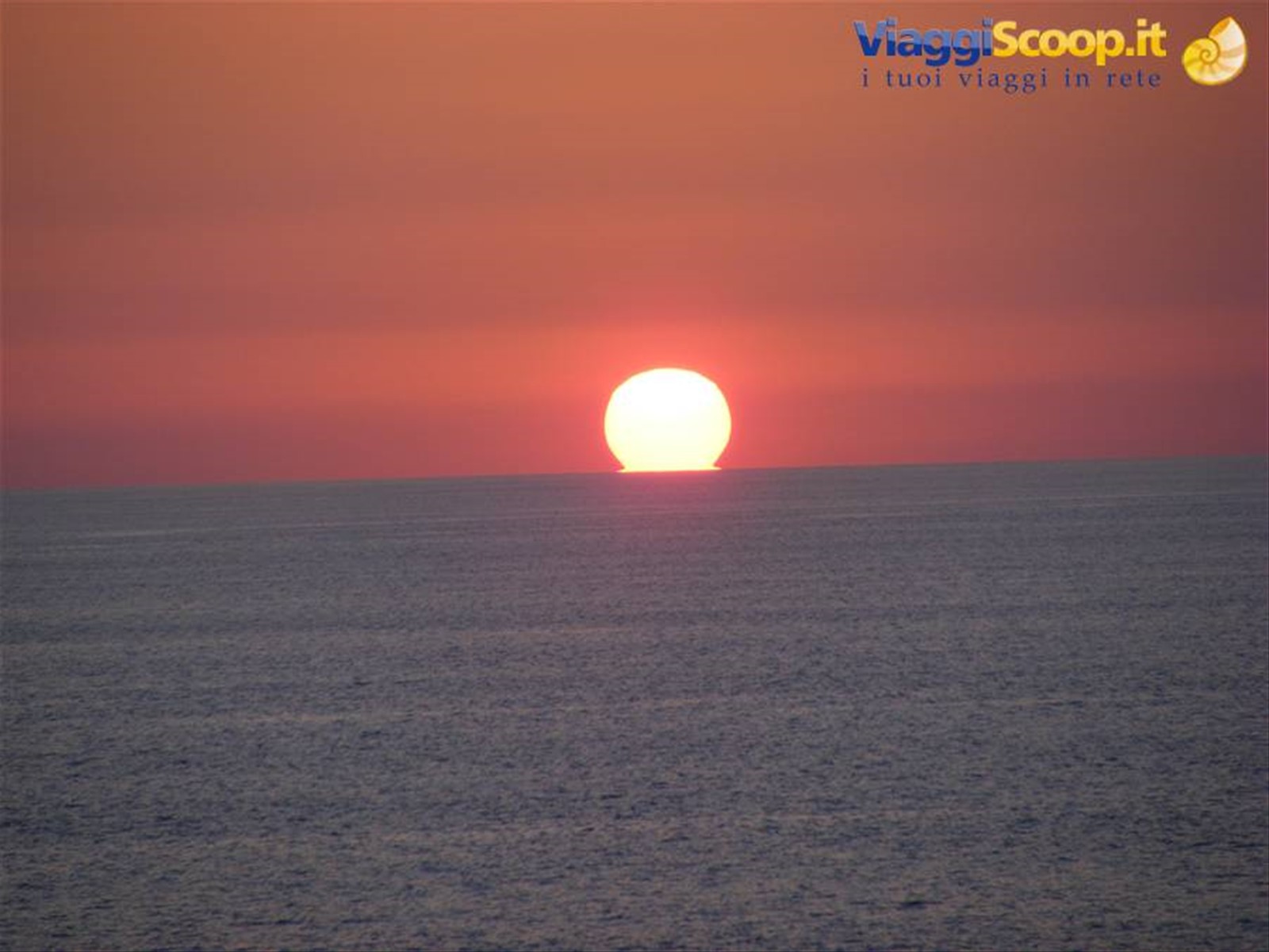 palla di fuoco in mare
