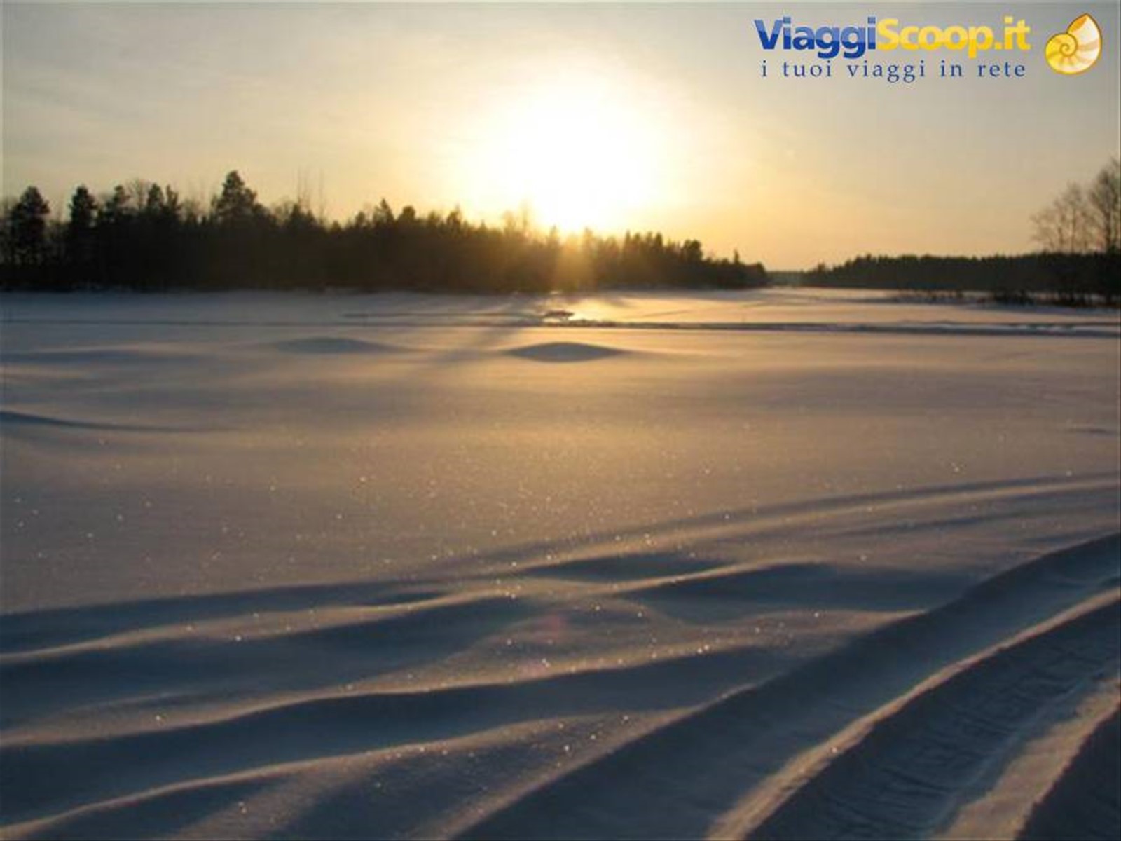 Al tramonto la neve si tinge di rosa